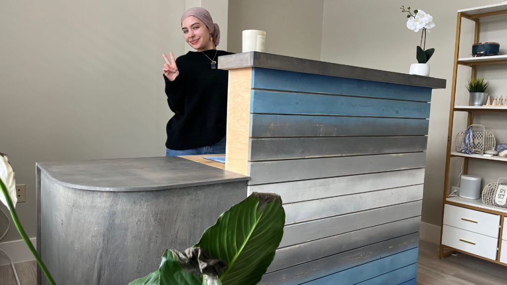 Sage Blossom employee Tori F. at our front desk.